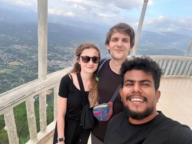 The iconic Ambuluwawa Tower surrounded by misty mountains